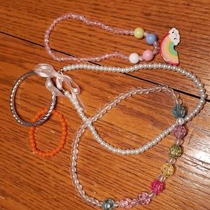 Little girls play jewelry